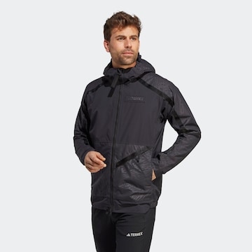 ADIDAS TERREX Outdoor jacket 'Utilitas' in Black: front