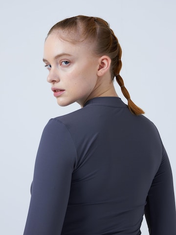 SPORTKIND - Camiseta funcional 'High-Neck' en gris