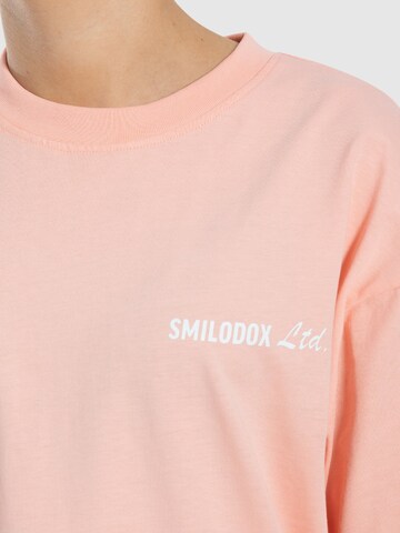 T-Shirt ' Liquid Brail ' Smilodox en rose