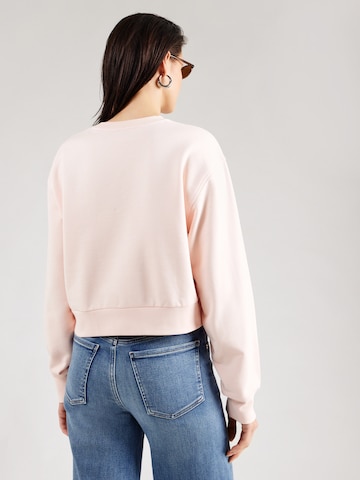 Bluză de molton de la Calvin Klein Jeans pe roz: spate