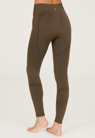 Athlecia Skinny Sportbroek 'NAGAR' in Groen