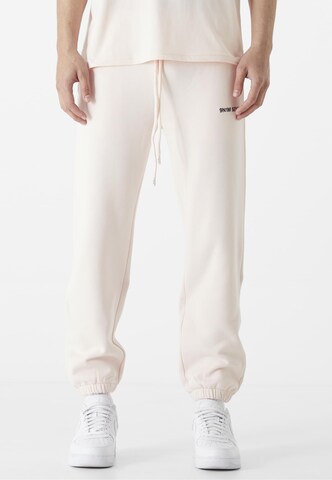 Loosefit Pantaloni di 9N1M SENSE in rosa: frontale