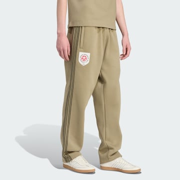 ADIDAS ORIGINALS Loose fit Trousers in Green: front