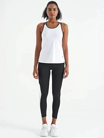 Haut de sport Tommy Life en blanc