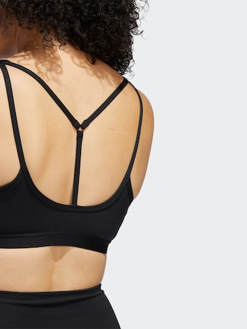 ADIDAS SPORTSWEAR - Soutien Bustier Soutien de desporto 'Coreessentials Medium-Support' em preto