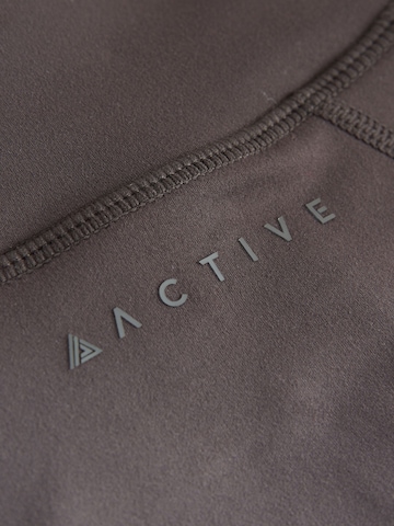 Next Urheilullinen collegetakki värissä ruskea