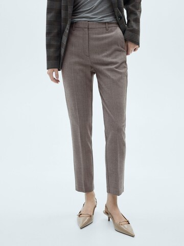MANGO Skinny Pressveckad byxa i beige: framsida