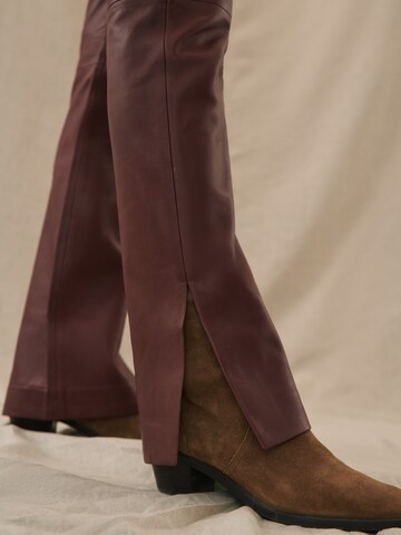 Kendall for ABOUT YOU Boot cut Trousers 'Dita' in Brown