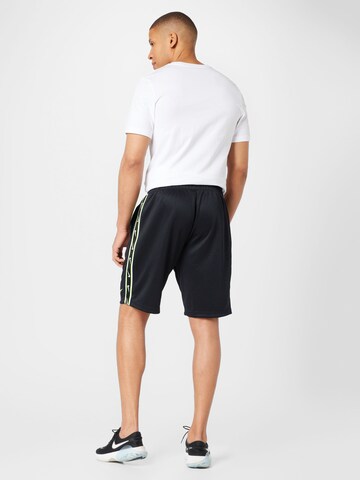 Nike Sportswear Loose fit Pants 'REPEAT' in Black