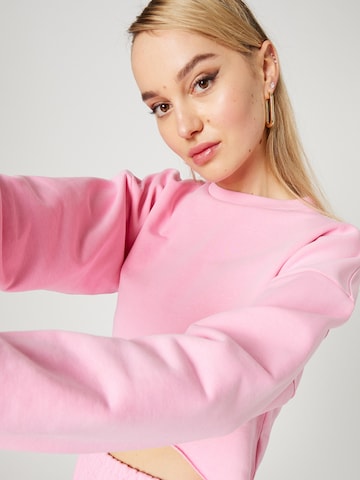 Hoermanseder x About You Sweatshirt 'Tessy' in Pink
