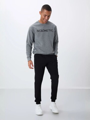 Sweat-shirt Tommy Life en gris