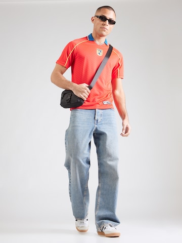 UNDER ARMOUR Functioneel shirt '96 Terrace Country' in Oranje