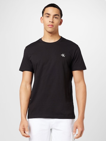 T-Shirt Calvin Klein Jeans en noir : devant