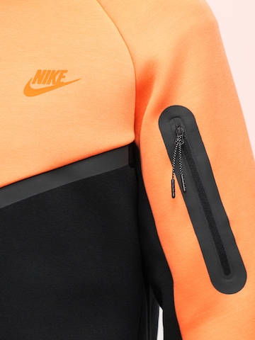 Nike Sportswear Tréning dzseki 'Tech Fleece' - narancs