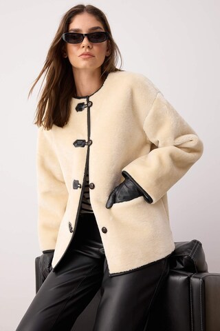 Trendyol Between-Season Jacket in Beige: front