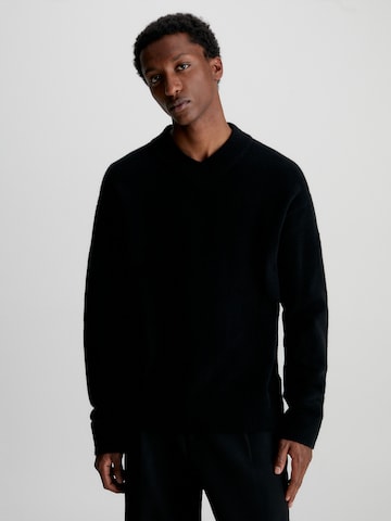 Pull-over Calvin Klein en noir : devant