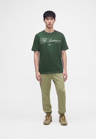 Nike Sportswear - Camisa em verde: frente