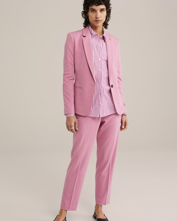 Tapered Pantaloni con piega frontale di WE Fashion in rosa