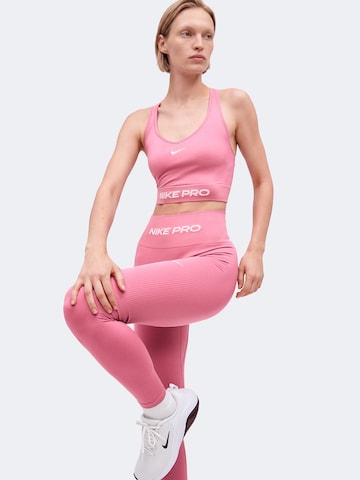 NIKE Skinny Παντελόνι φόρμας 'Nike Pro' σε ροζ