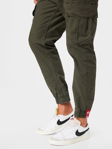 ALPHA INDUSTRIES Tapered Cargo nadrágok - szürke