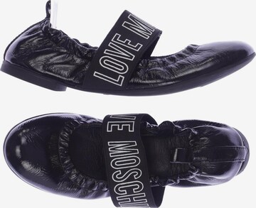 Love Moschino Flats & Loafers in 38 in Black: front