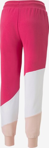 Tapered Pantaloni sportivi di PUMA in rosa