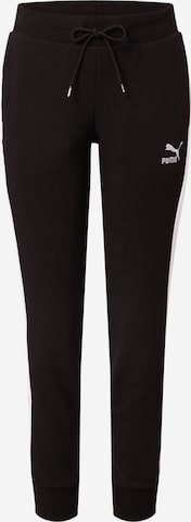 PUMA - Tapered Pantalón deportivo 'Iconic T7' en negro: frente