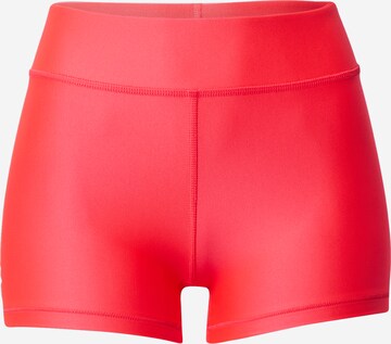 Pantalon de sport UNDER ARMOUR en rose : devant