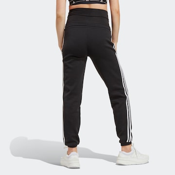 ADIDAS SPORTSWEAR Tapered Urheiluhousut värissä musta