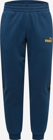 PUMA Sports trousers in Blue: front