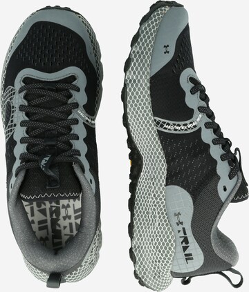 UNDER ARMOUR Running Shoes in Black