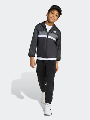 ADIDAS SPORTSWEAR Αθλητικό μπουφάν 'LK TIBERIO' σε μαύρο