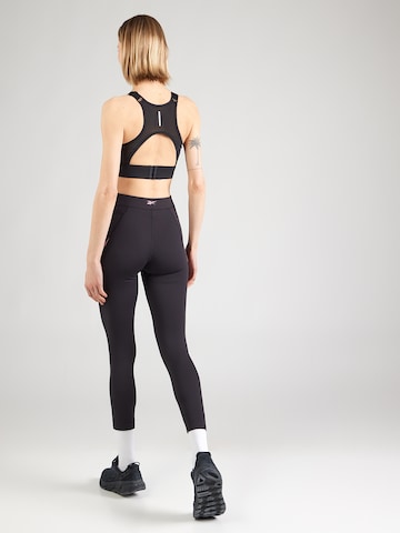 Reebok Skinny Sportnadrágok 'LUX' - fekete