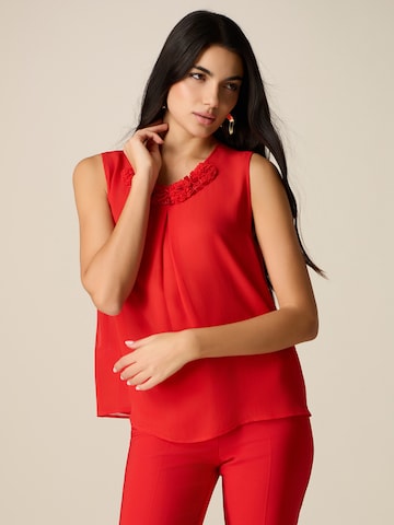 Camicia da donna di oltre in rosso: frontale