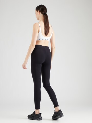 Champion Authentic Athletic Apparel Skinny Sporthose in Schwarz