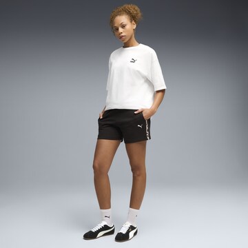 PUMA Regular Sportbroek 'Essentials Graphics' in Zwart: voorkant