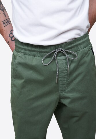 Effilé Pantalon chino recolution en vert