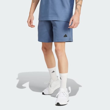 ADIDAS SPORTSWEAR Loosefit Sportovní kalhoty 'Z.N.E. Premium' – modrá: přední strana