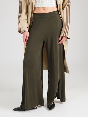 ABOUT YOU Bő szár Nadrág 'Caro' - zöld: elől