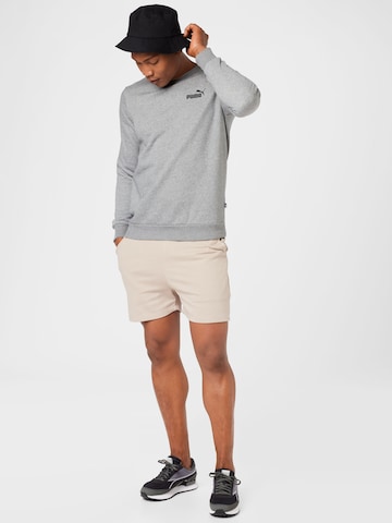 PUMA - Sweatshirt de desporto 'Essentials' em cinzento