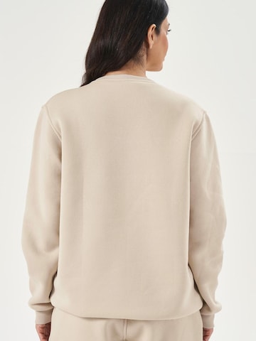 LOUIS LECLER Sweatshirt 'Avery' in Beige