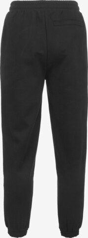 Tapered Pantaloni di PUMA in nero