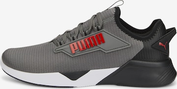 Chaussure de course 'Retaliate 2' PUMA en gris : devant