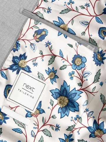 Next Slim Fit Pikkutakki värissä harmaa