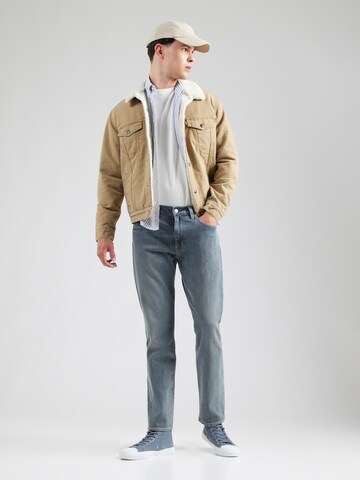 LEVI'S ® Tapered Jeans '502' in Grau