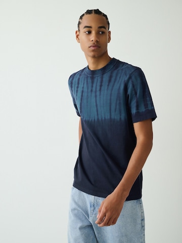 Next T-shirt i beige: framsida