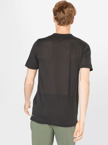 PUMA Funktionsshirt in Schwarz