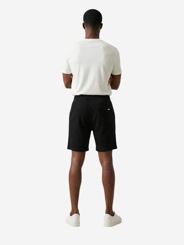 regular Pantaloni di Gianni Lupo in nero