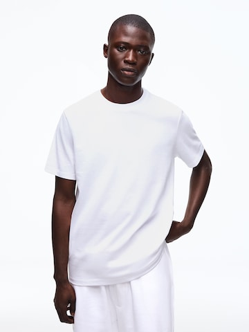 Bershka Trenirka za tek | bela barva