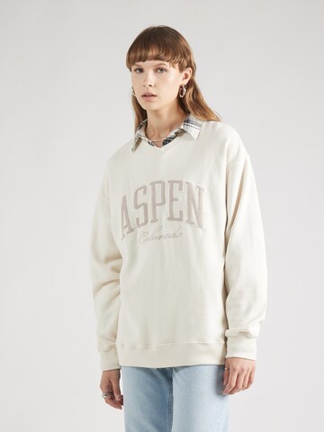 Sweat-shirt HOLLISTER en beige : devant